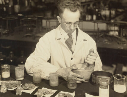 photo of man in a chemistry lab